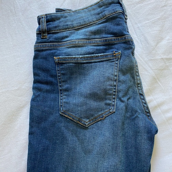 H&M size 8 slim mid waist jeans with rips - Picture 2 of 3
